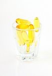 Vitamin Capsules In Glass Stock Photo