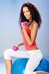 Weight Exercise On The Big Blue Ball Stock Photo