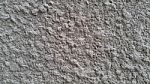 White Knobby Cement Wall Stock Photo
