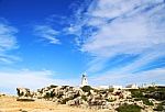 White Mediterranean Lighthouse Stock Photo