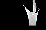 White Milk In Glass Stock Photo