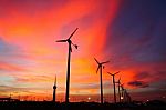 Wind Turbine Silhouettes Stock Photo