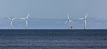 Wind Turbines Off Shore At Colwyn Bay Stock Photo