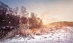 Winter Misty Dawn On The River. Snowflakes, Snowfall. Sunny Wint Stock Photo