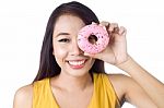 Woman And Donut Stock Photo