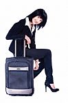 Woman And Suitcase Stock Photo