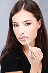 Woman Applying Cosme Stock Photo