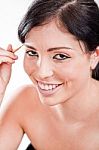 Woman Applying Eyebrow Pencil Stock Photo
