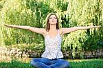 Woman At Meditation Outdoor Stock Photo