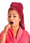 Woman Brushing Her Teeth Stock Photo