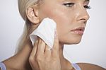 Woman Clean Face With Wet Wipes Stock Photo