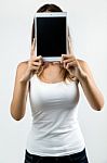 Woman Cover Her Face With Digital Tablet. Isolated On White Stock Photo