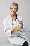 Woman Doctor Having Lunch Stock Photo