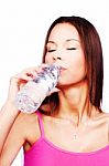 Woman Drinking Water From Bottle Stock Photo