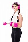 Woman Enjoying Workout With Music Stock Photo
