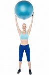 Woman Exercising With Gymnastic Ball Stock Photo