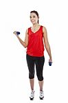 Woman Exercising With Weights Stock Photo