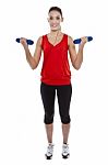 Woman Exercising With Weights Stock Photo