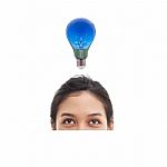 Woman Has Bright Idea Stock Photo