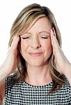 Woman Having A Bad Headache Stock Photo