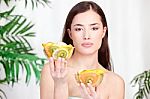 Woman Holding Bowls Full Of Fruit Stock Photo