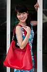 Woman Holding  Red Bag Stock Photo