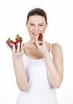 Woman Holding Strawberries Stock Photo