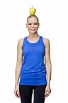 Woman In Fitness Clothing Stock Photo