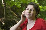 Woman In Forestry And Mobile Phone Stock Photo