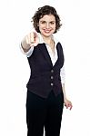 Woman In Formals Pointing Forward Stock Photo
