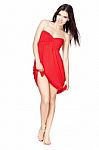 Woman In Red Dress Barefoot Stock Photo