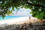 Woman Is Walking On The Beach For Relaxation Stock Photo