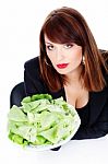 Woman Offering Green Salad Stock Photo