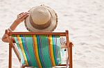 Woman On Beach Chair Stock Photo