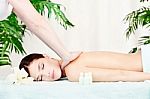 Woman On Shoulder Massage Stock Photo