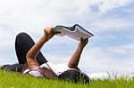Woman Reading A Book Stock Photo