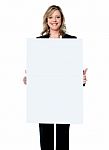 Woman Showing Signboard Stock Photo
