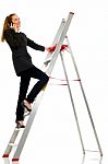 Woman Standing On Ladder Stock Photo