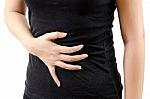 Woman Suffering From Abdominal Pain Stock Photo