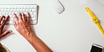 Woman Typing On Keyboard Stock Photo