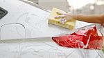 Woman Washing A Car With A Sponge And Soap Stock Photo