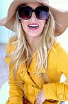 Woman Wearing Hat And Sunglasses Stock Photo
