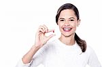 Woman With A Vitamin Pill Stock Photo
