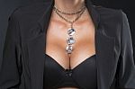 Woman With Big Breasts And Jewelry On Neck Stock Photo