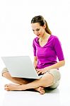 Woman With Laptop Cross-legged Stock Photo