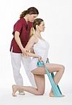 Woman With Physiotherapist Stock Photo