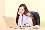 Woman Working On Computer In Office Stock Photo