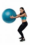 Woman Worksout With Fitness Ball Stock Photo