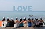 Women Friends Sit Hug Together Look Love Blue Sea Sky Stock Photo