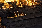 Wooden Board Engulfed In Flames Stock Photo